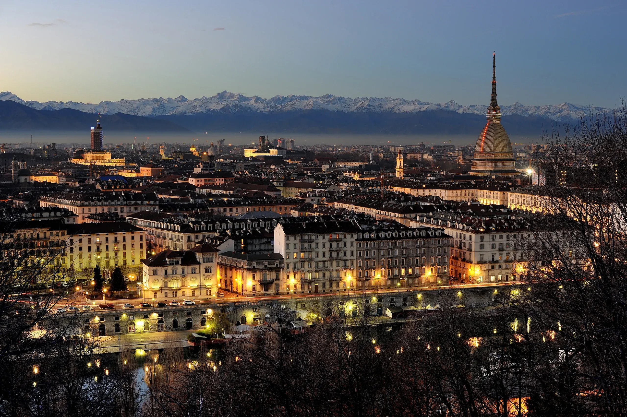 Turin at dusk from Monte dei Cappuccini: the city lights, the Mole Antonelliana and the Alps